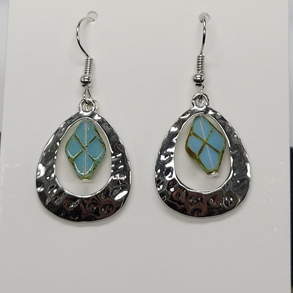 Designed by AveryMarie Treasures Jewelry - sliver oval drop earrings with rustic blue stones